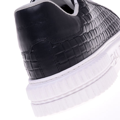 Sneakers noires à motif tressé
