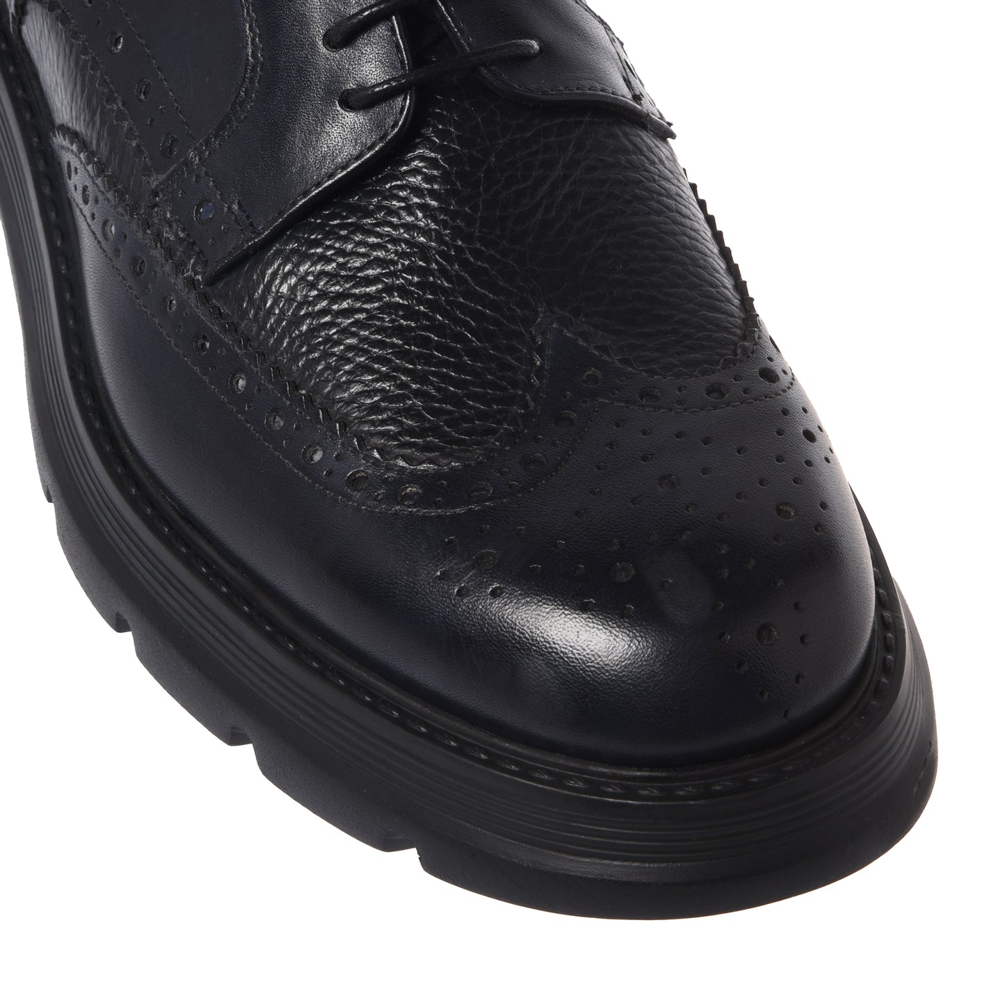 Black lace-up shoes in washed and tumbled leather