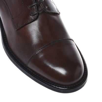 Dark brown leather lace-up shoe