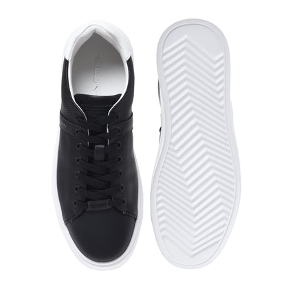 Black perforated leather sneaker