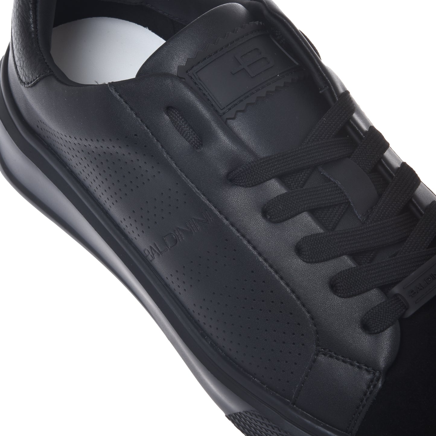 Black perforated suede and leather sneaker