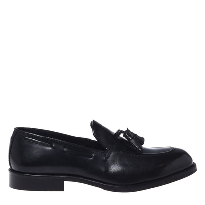 Black leather slip-ons