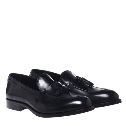 Black leather slip-ons