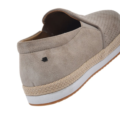Perforated beige suede slip-ons