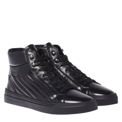 Baskets en cuir et cuir matelassé noir