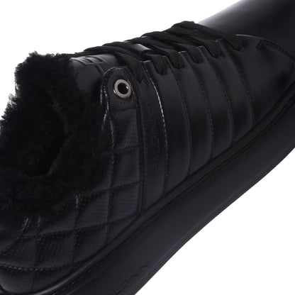 Baskets noires en cuir matelassé avec picots